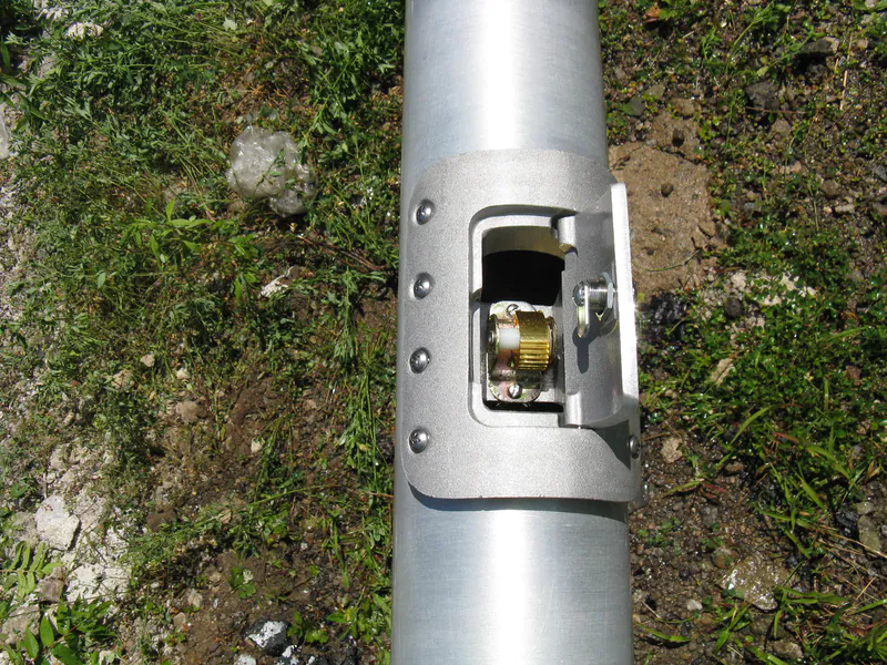 Open winch access door showing the internal halyard drum and cable